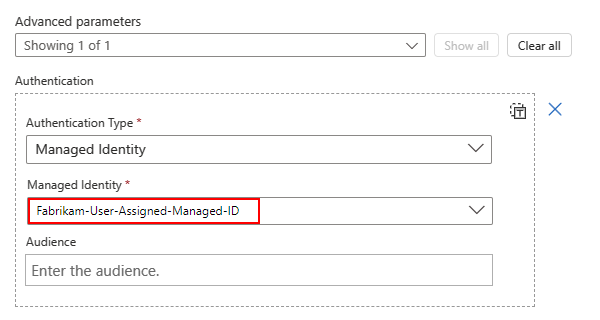 Screenshot shows Consumption workflow, HTTP action, and Managed Identity property with selected user-assigned identity.