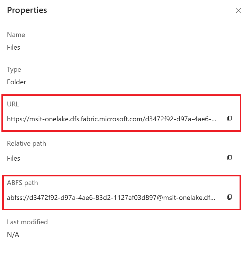 Screenshot that shows URL and ABFS path of a OneLake artifact in Microsoft Fabric UI.