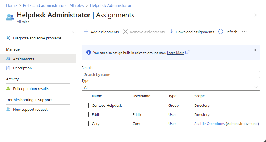 Screenshot that lists role assignments with tenant scope.