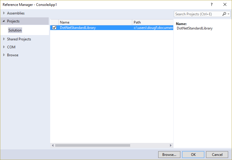 In Visual Studio, right-click on the References node and choose Add Reference... then switch to the Solution  Projects tab as shown Referencing a .NET Standard Library