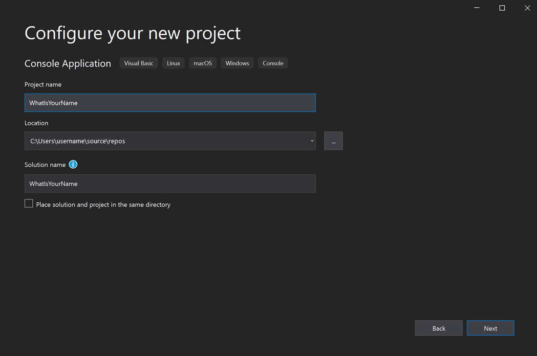Screenshot showing the 'Configure your new project' window in Visual Studio with the Project name field set to 'WhatIsYourName'.