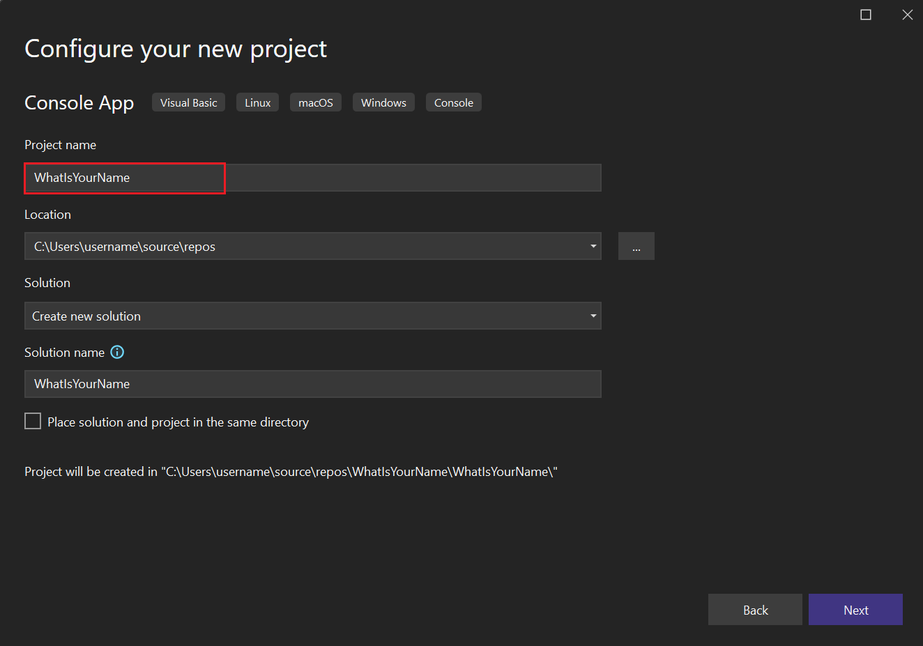 Screenshot showing the 'Configure your new project' window in Visual Studio with the Project name field set to 'WhatIsYourName'.