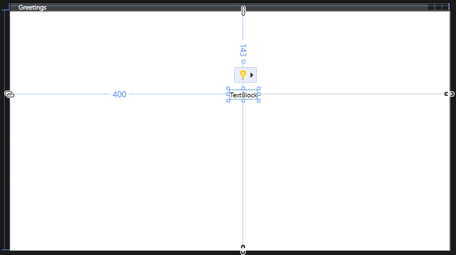 Skärmbild som visar textblockskontrollen placerad i formuläret Hälsningar med riktlinjerna synliga.